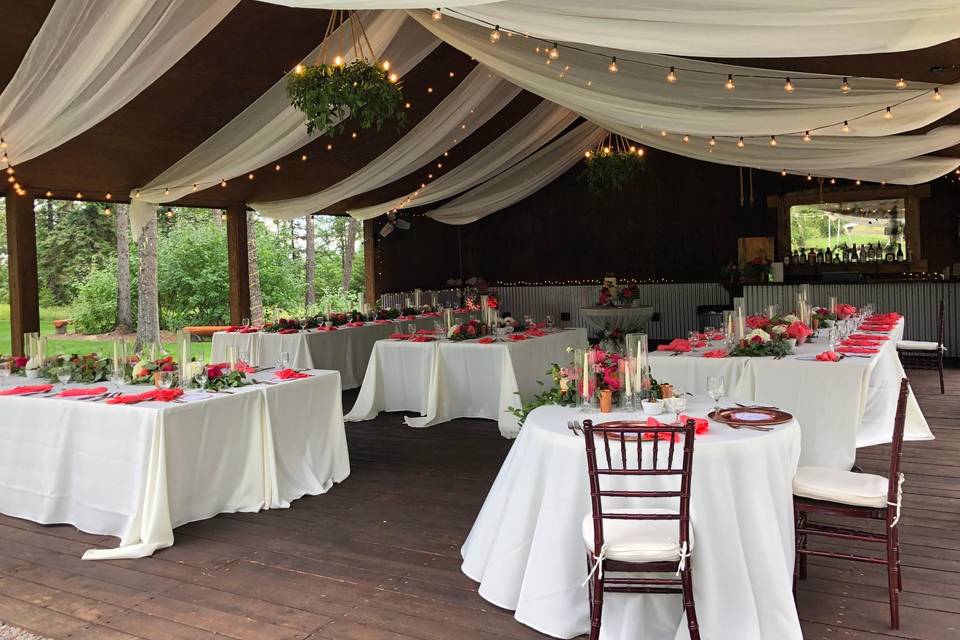 Pavilion decorated with drapery and pops of pink