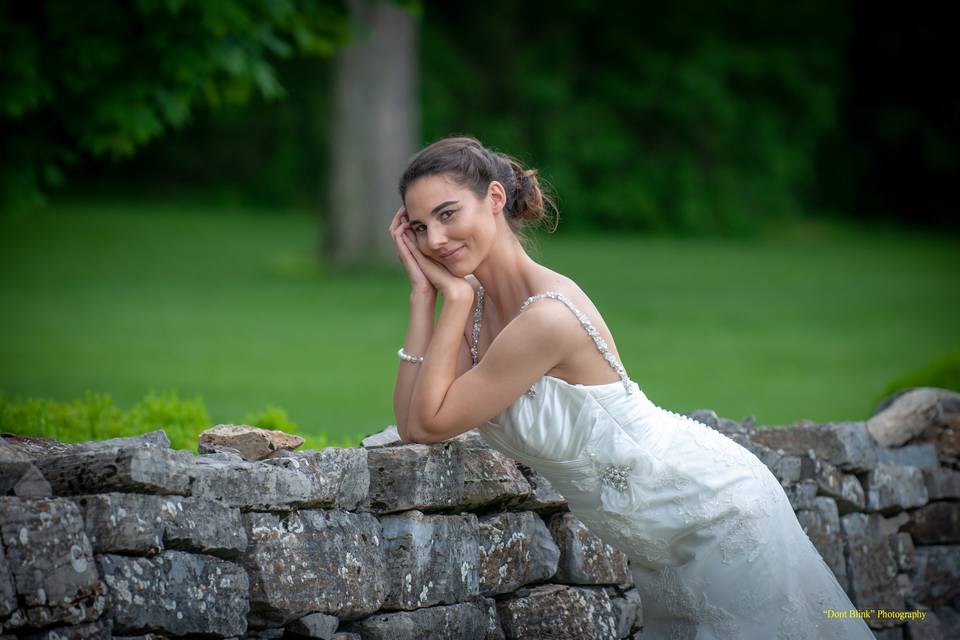 Bride by a wall