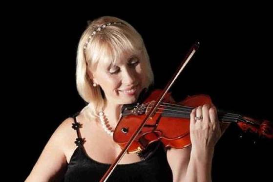 Live violin music at a wedding is poetry to the soul and makes your event memorial
