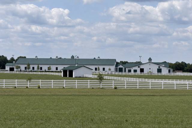 Completed Brush Row Farm with white fencing.jpg