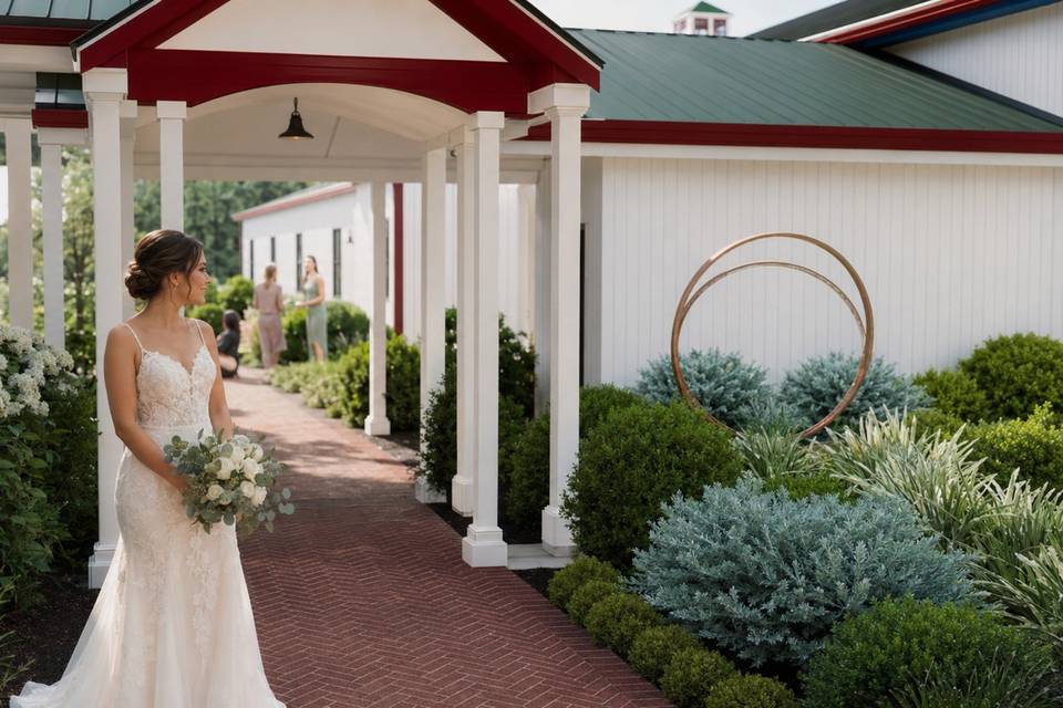 Bridal portrait beneath white garden columns.jpg