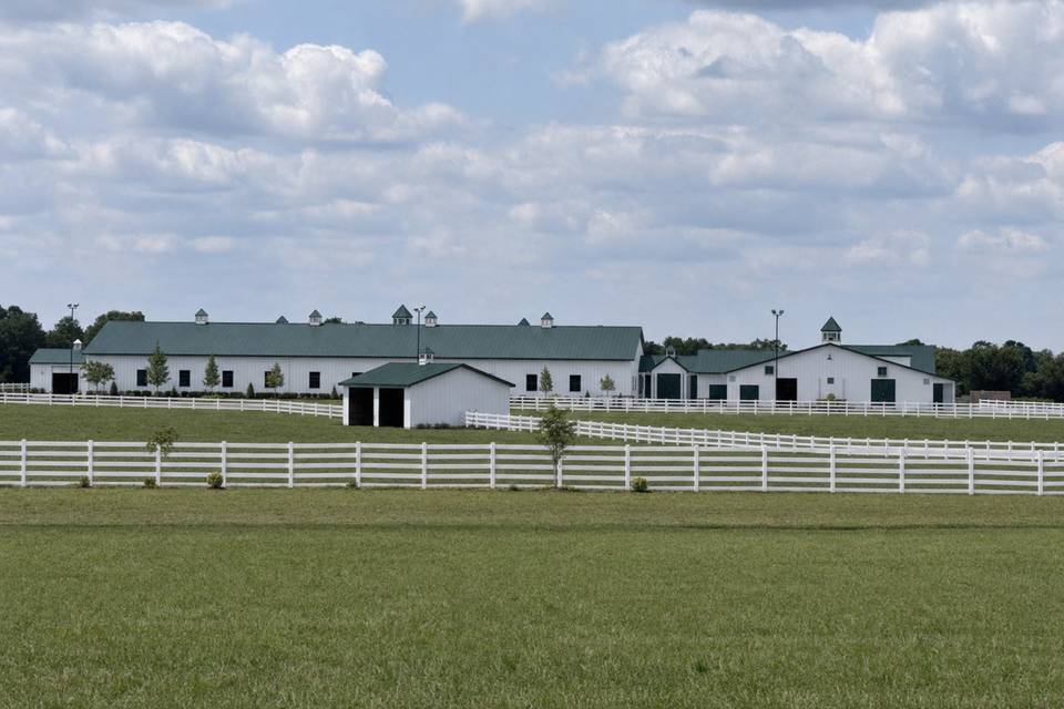 Completed Brush Row Farm with white fencing.jpg