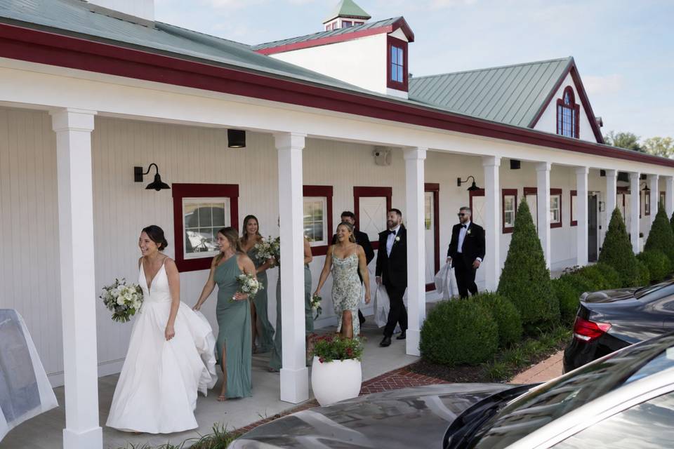 Joyful bridal party arrival at Brush Row.jpg