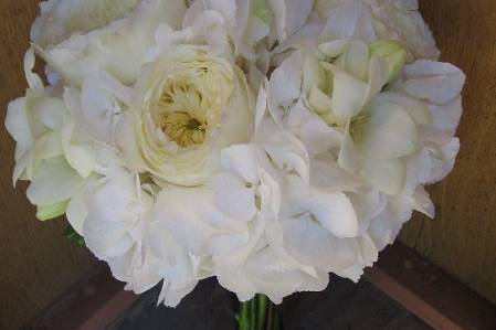 a true classic with hydrangea, freesia, orchid blooms and fragrant garden roses