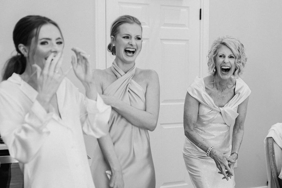 Bride and family laughing