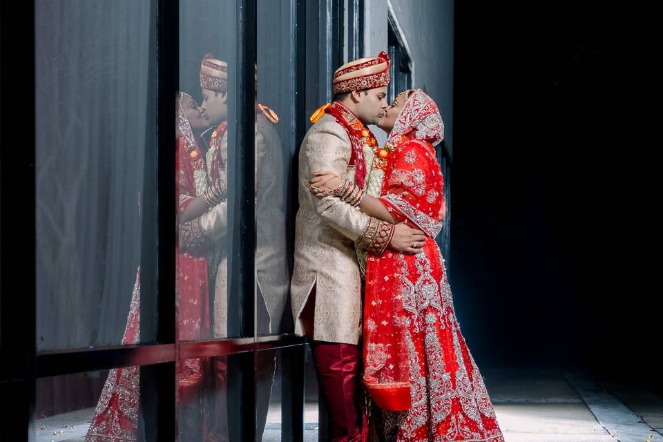 Bride and groom reflection