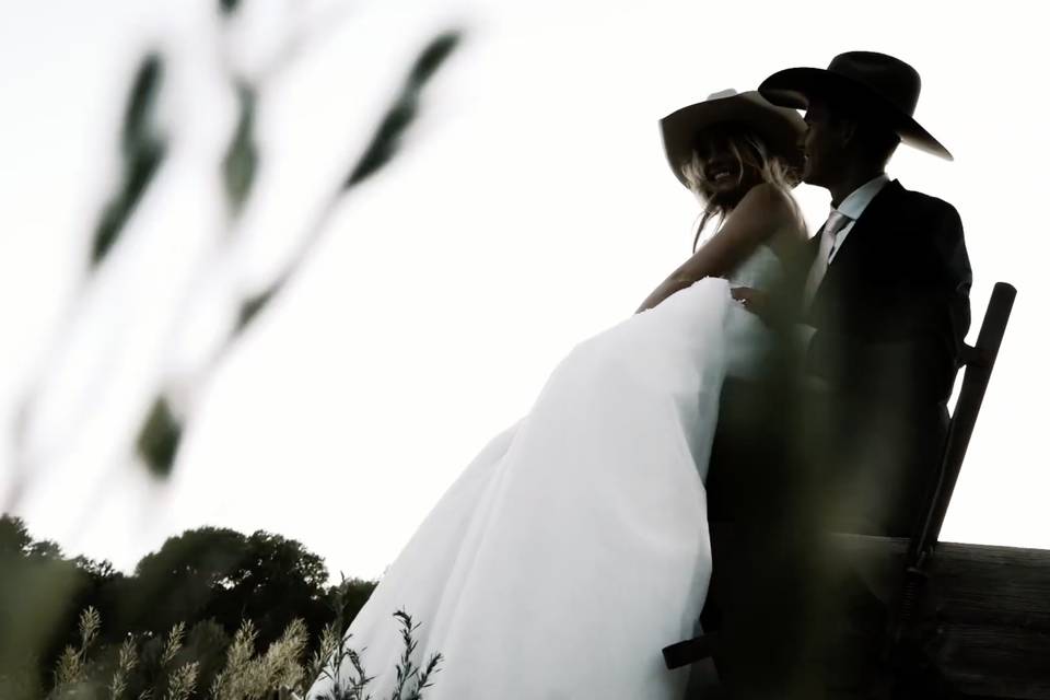 Rustic western wedding embrace