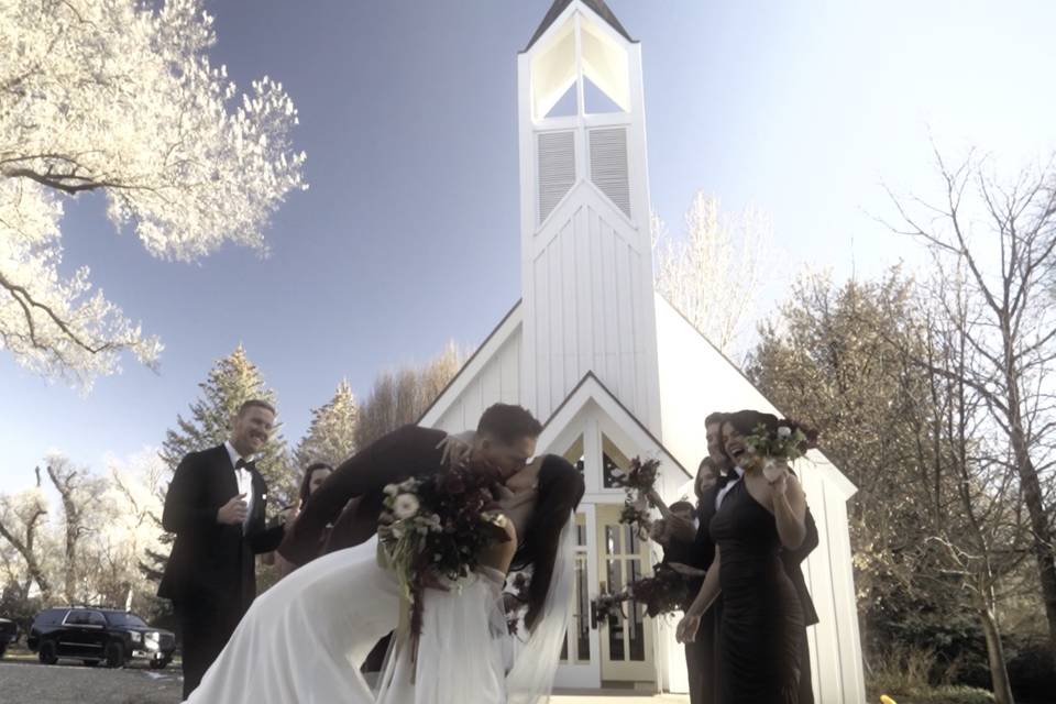 Joyful church exit kiss