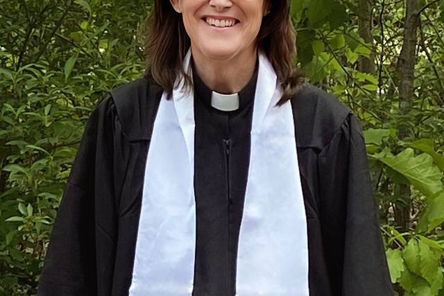 Rev. Kelly in wedding robe