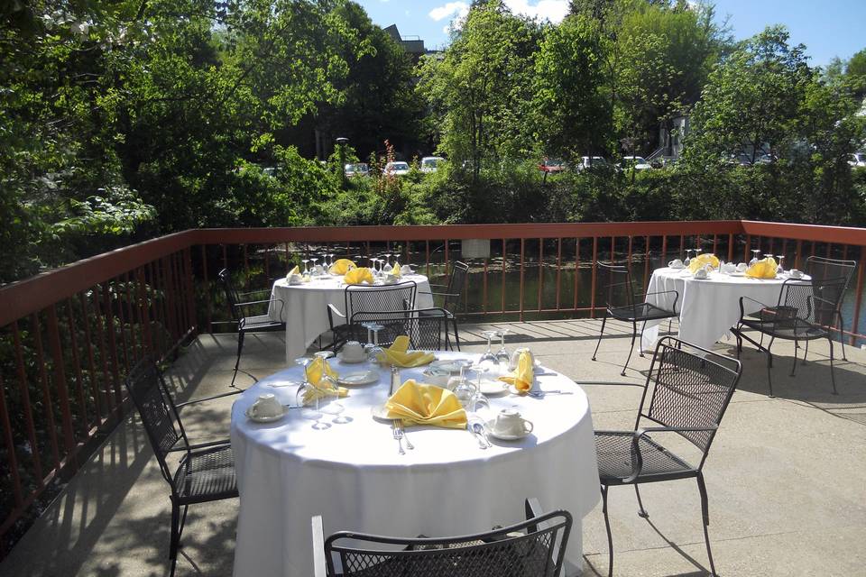 Outdoor patio overlooking Stony Brook waterfall