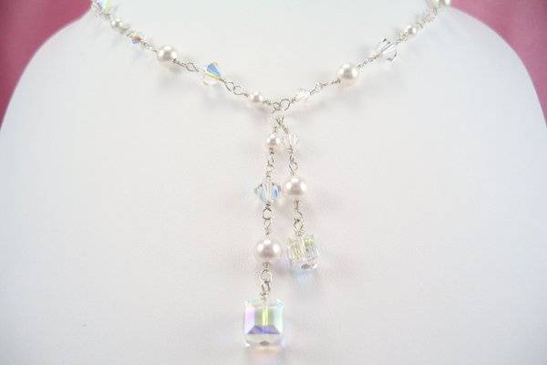 The Anna crystal and pearl necklace. Each link is crafted by hand from sterling silver wire. Available in a variety of crystal colors and with a choice of faux or freshwater pearls!