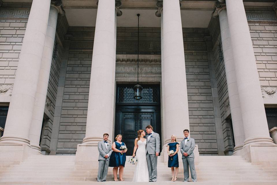 Couple with their bridal attendants