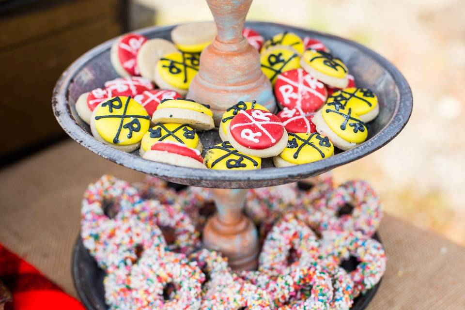 This is an example of the variety of candy and sweets we provide and could provide you for a candy buffet at your wedding or event.
Sweet City Candy provided the Chocolate Covered Pretzels with Rainbow Sprinkles for this rustic event.