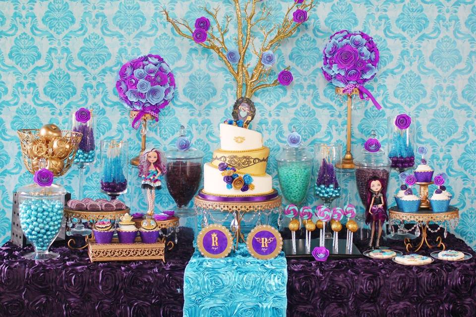 This is an example of the variety of candy and sweets we provide and could provide you for a candy buffet at your wedding or event.
Sweet City Candy provided the candy for this blue and purple candy buffet. It included candy fruit slices, Rock Candy, Gum Balls, Gummy Bears and Jelly Beans.