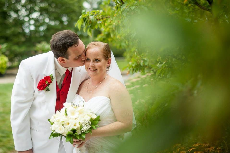 Groom kisses his bride