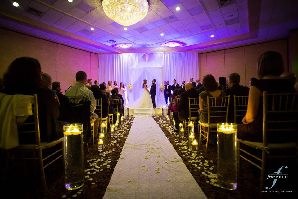 Our wedding planners will help you set the tone for a beautiful, gorgeous wedding ceremony. Photo courtesy of Fritz Photography.