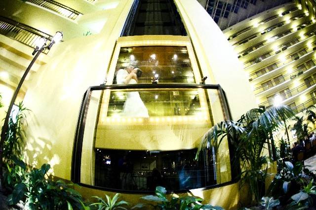 A popular wedding photo often taken at the hotel includes a shot of our gorgeous atrium as the couple rides up in the elevator for a quick kiss.
