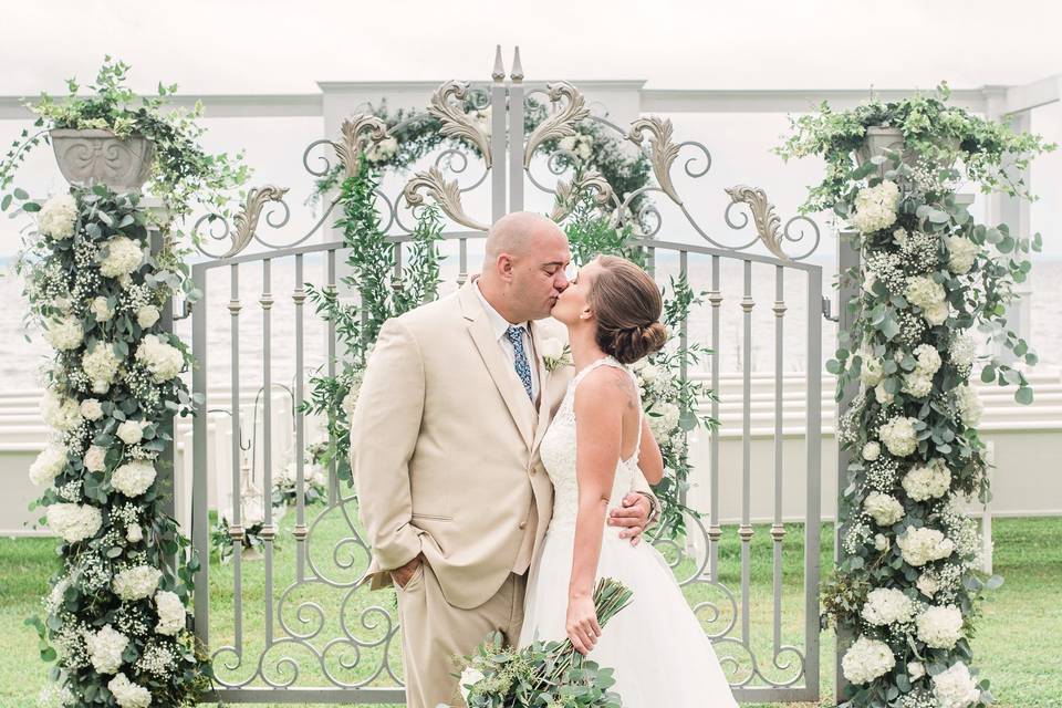 COUPLE AT GATES IN VENUE