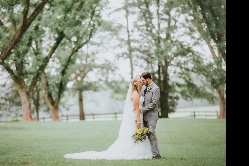 Wedding dress from Best Bride Prom & Tux. Photo by Twinkling Eye Photography.