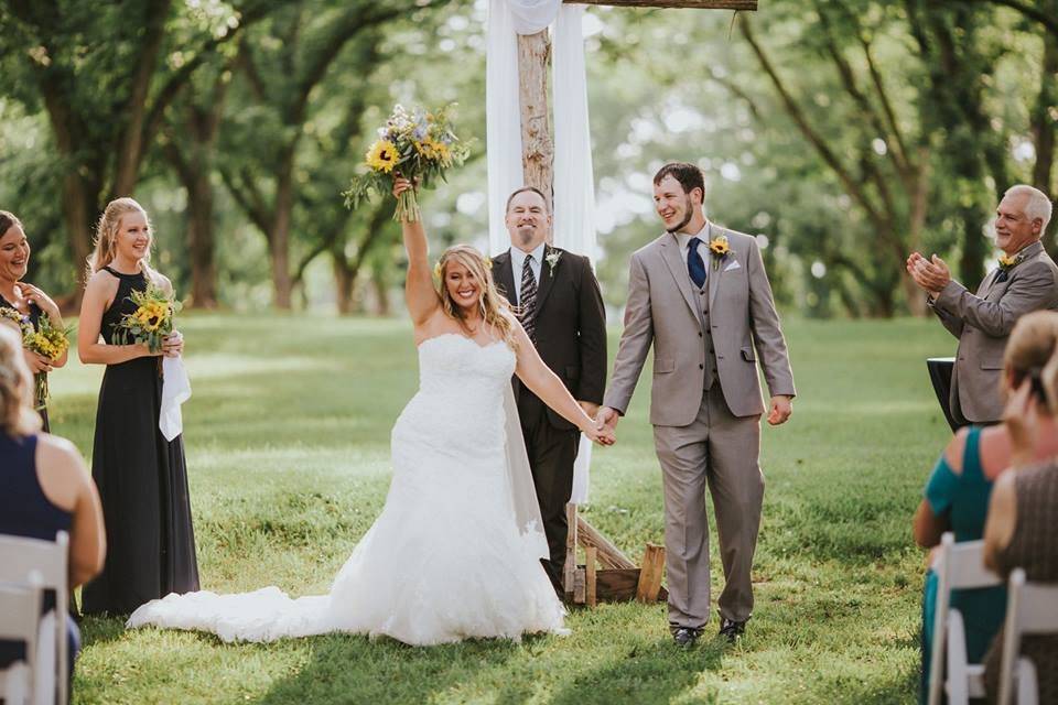 Wedding dress from Best Bride Prom & Tux. Photo by Twinkling Eye Photography.