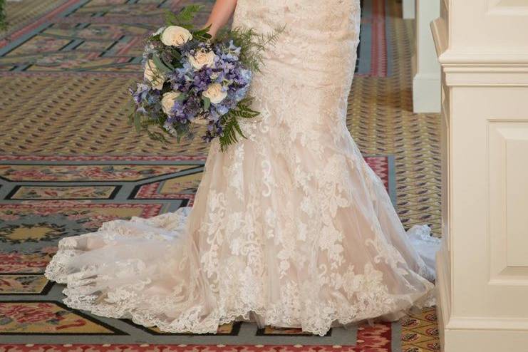 Dress by Best Bride Prom & Tux. Photo by Dwayne Schmidt Photography. Venue is Cabin Among the Oaks.
