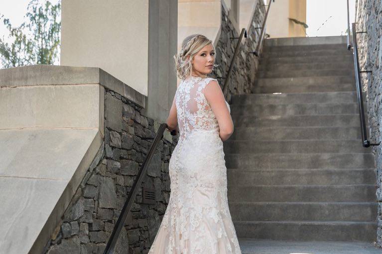 Dress by Best Bride Prom & Tux. Photo by Dwayne Schmidt Photography. Venue is Cabin Among the Oaks.