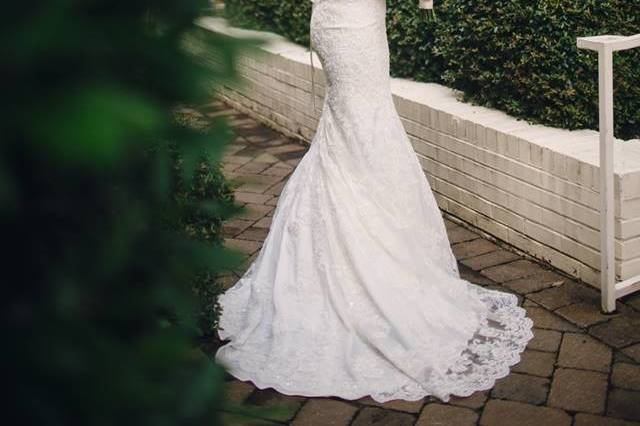 Wedding dress from Best Bride Prom & Tux. Photography by Red Boat Photography. Venue Proximity Hotel and Proximity Hotel Weddings in Greensboro NC. Hair and Makeup by Laura Meredith at Dolce Vita Salon LLC.