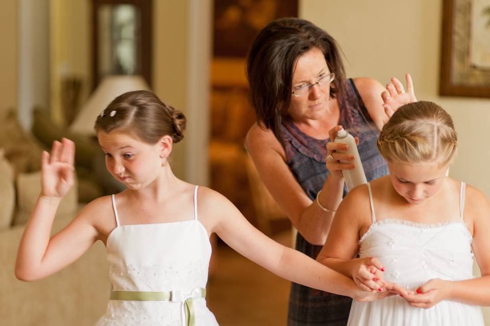 Fun photo taken at a Naples wedding of girls getting ready for wedding