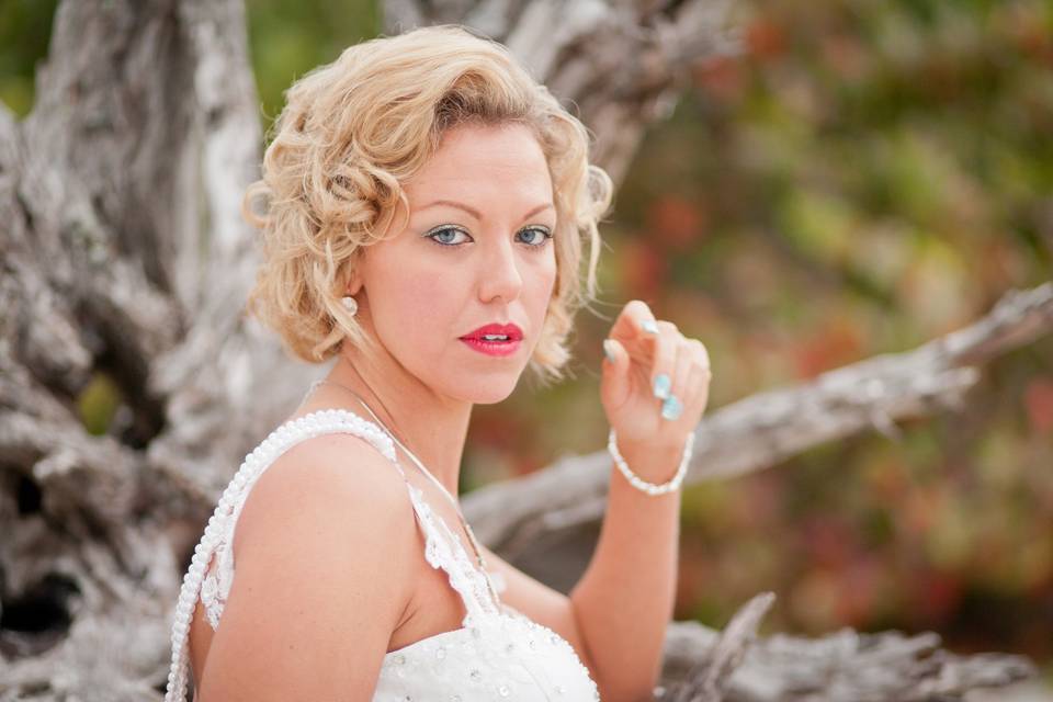 bride poses at her Sanibel Island sunrise wedding