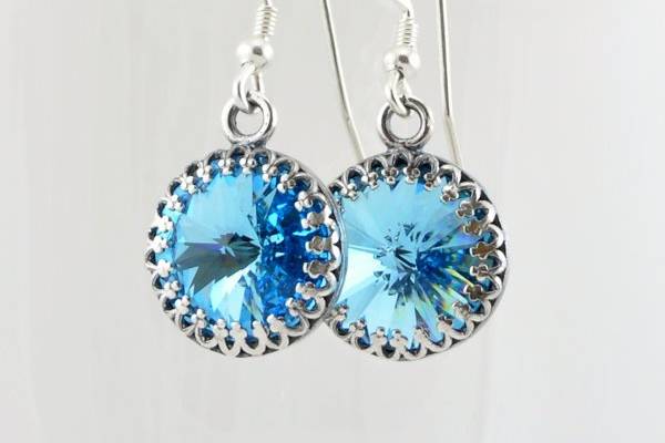 Aquamarine Swarovski Crystal Drop Earrings with Sterling Silver Accents
The authentic Swarovski rivoli crystals on these earrings have a .5