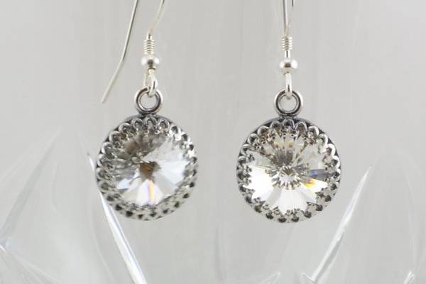 Clear Swarovski Crystal Drop Earrings with Sterling Silver Accents
The authentic Swarovski rivoli crystals on these earrings have a .5
