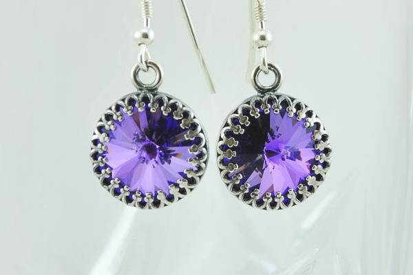 Dark Purple Swarovski Crystal Drop Earrings with Sterling Silver Accents - Crystals shine bright blue at certain angles
The authentic Swarovski rivoli crystals on these earrings have a .5