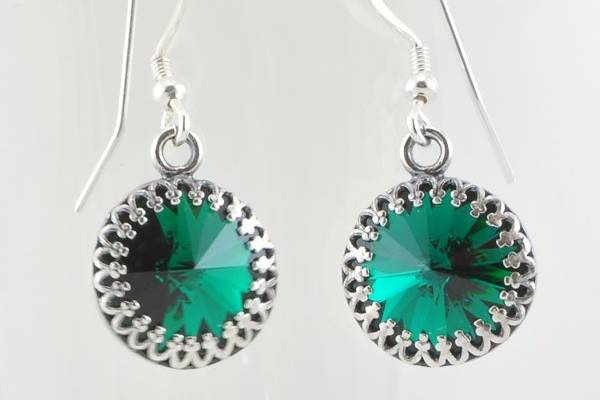 Emerald Green Swarovski Crystal Drop Earrings with Sterling Silver Accents
The authentic Swarovski rivoli crystals on these earrings have a .5