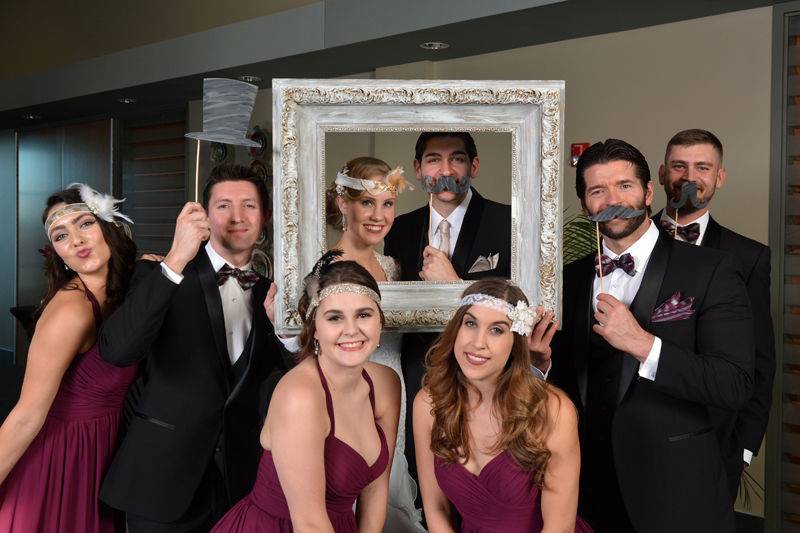 Photobooth with newlyweds and guests