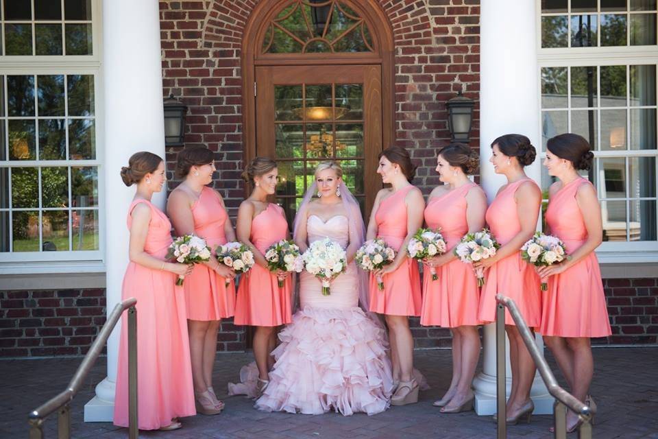 Bride and bridesmaids in pink dresses