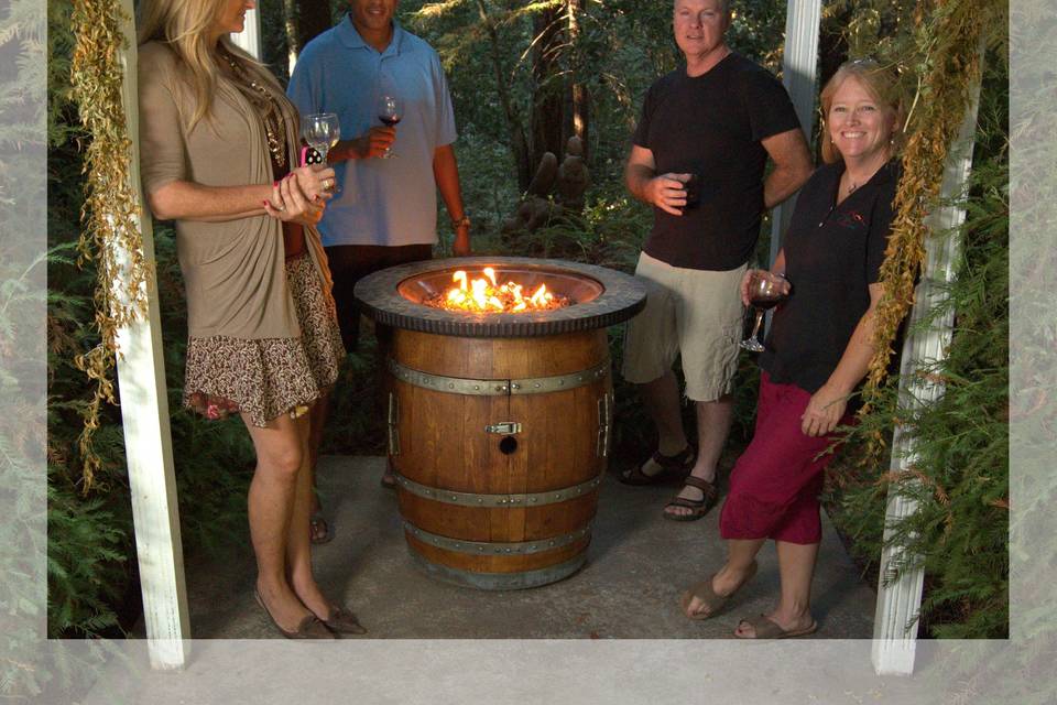 Wine barrel fire pit. Create a cozy gathering spot for your guests to enjoy!