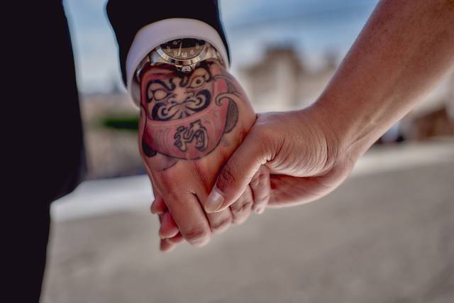 Wedding rings and hands