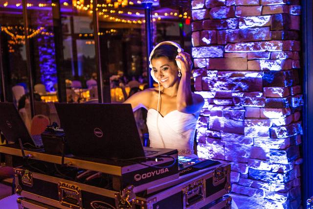 Bride behind the DJ Table