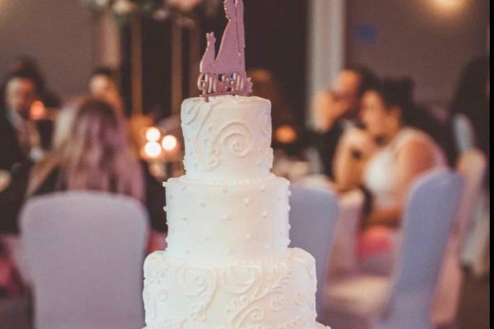 5 tier scroll & dot fake cake
