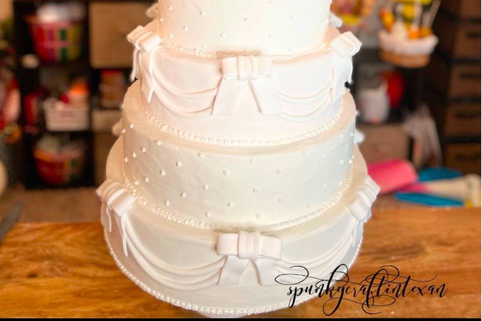 7 tier bow & dot fake cake