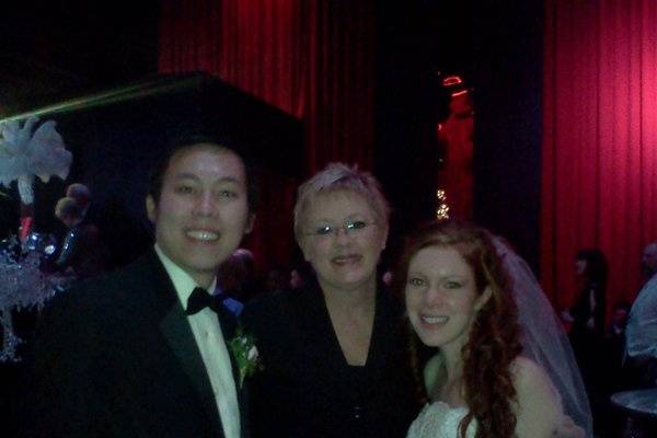 Newlyweds with the officiant