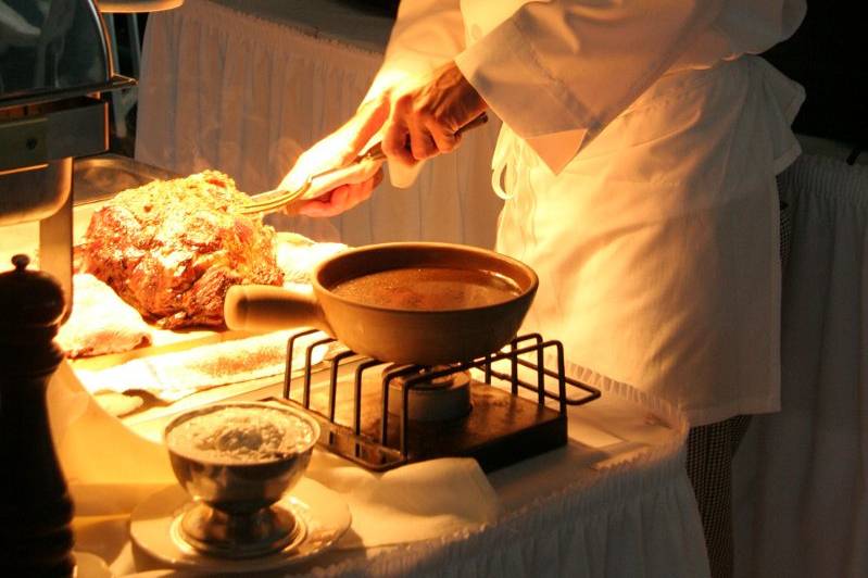 Chef carving meat