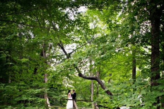 Bride and Groom over bridge