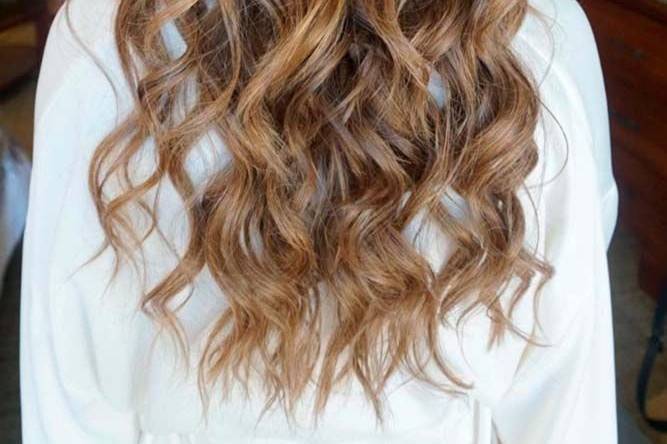 Beach waves and pinned back hair