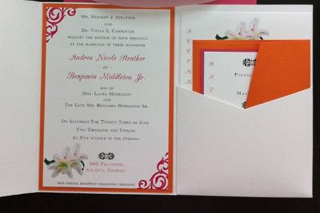 Pocket fold with detail card, RSVP card, response  envelope, monogram clear vellum belly band, and outer envelope with liner