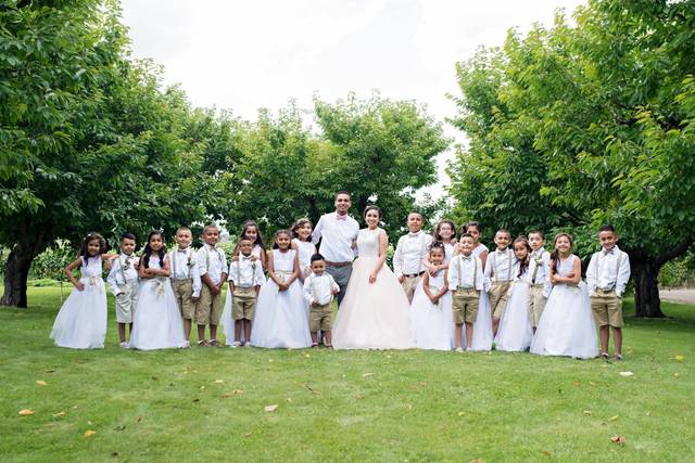 Newlyweds and the kids at the wedding