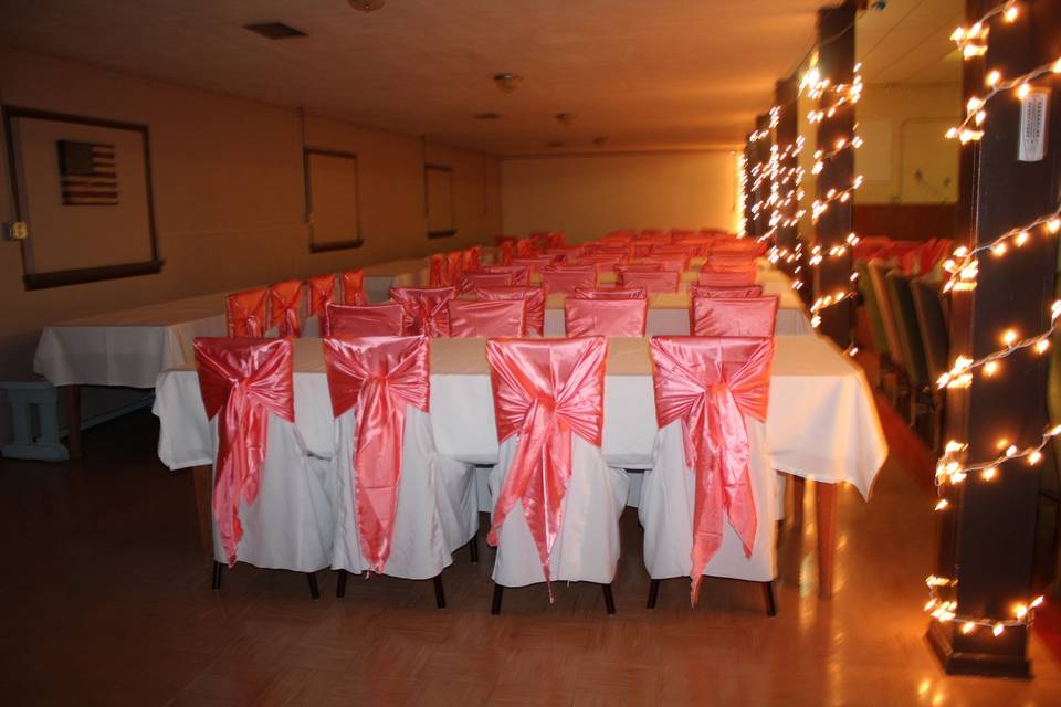 Pink decor on reception chairs