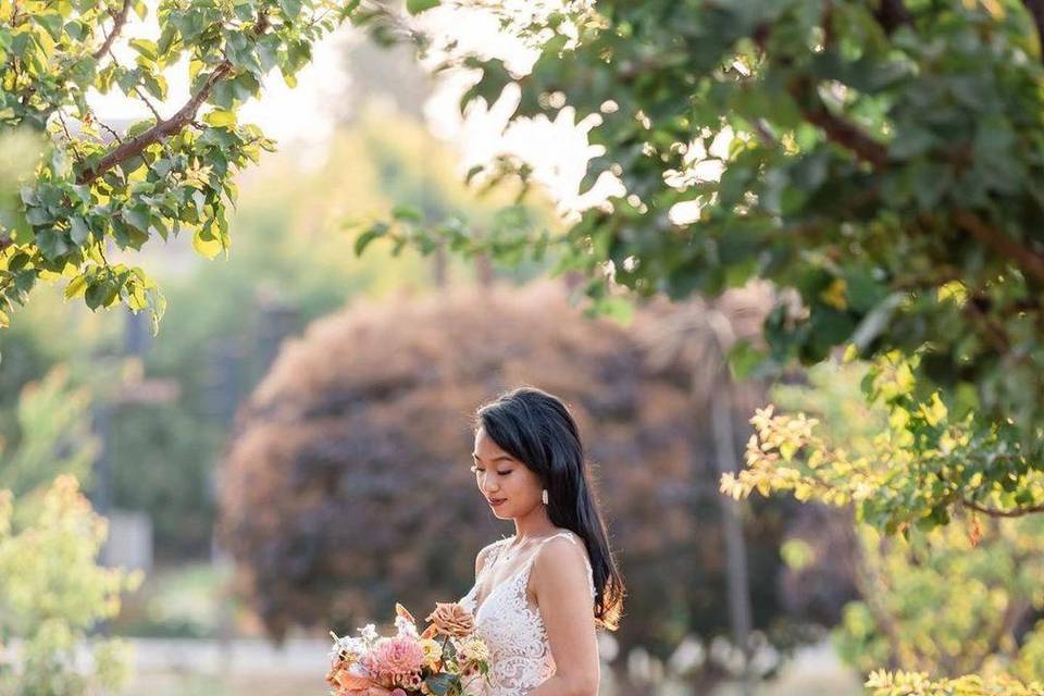 Bride in apricot orchard