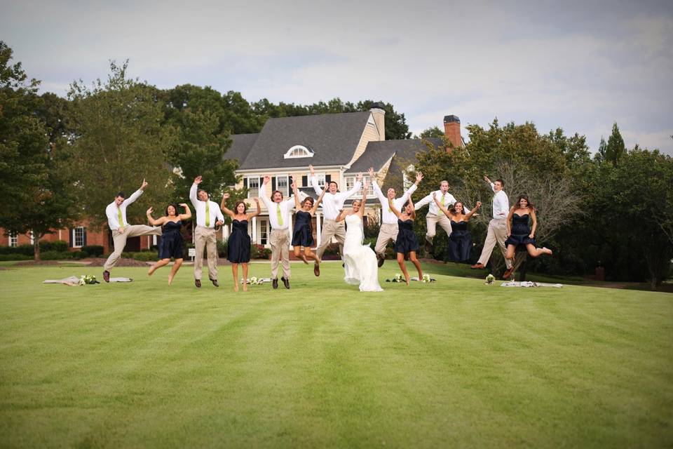 The couple with their bridesmaids and groomsmen