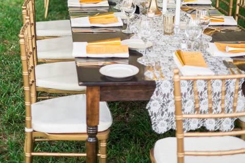 Table setting with floral and candle centerpiece